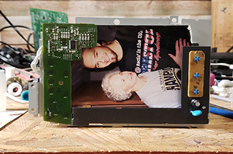 Parts scrapped from a fax machine used to create picture frame.