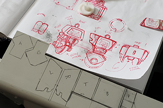 Keychain design presented next to keychain model.