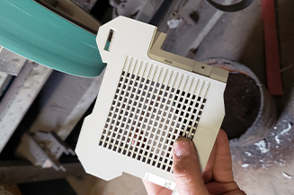 Vent piece cut from fax machine parts.