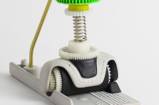 Close up on bottom of fax part robot.