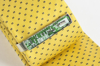 Repurposed jewlery made out of a fax machine.