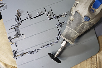 Piece of fax machine cut out for F.A.X Wing 3000 design.