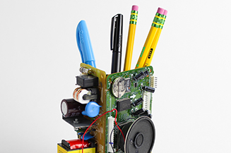 Close up of pen holder fax machine.