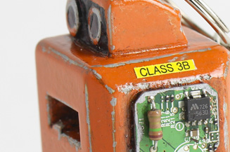 Close up of fax parts keychain head.